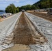 Chipping away old concrete to preserve Montgomery Dam piers for the future