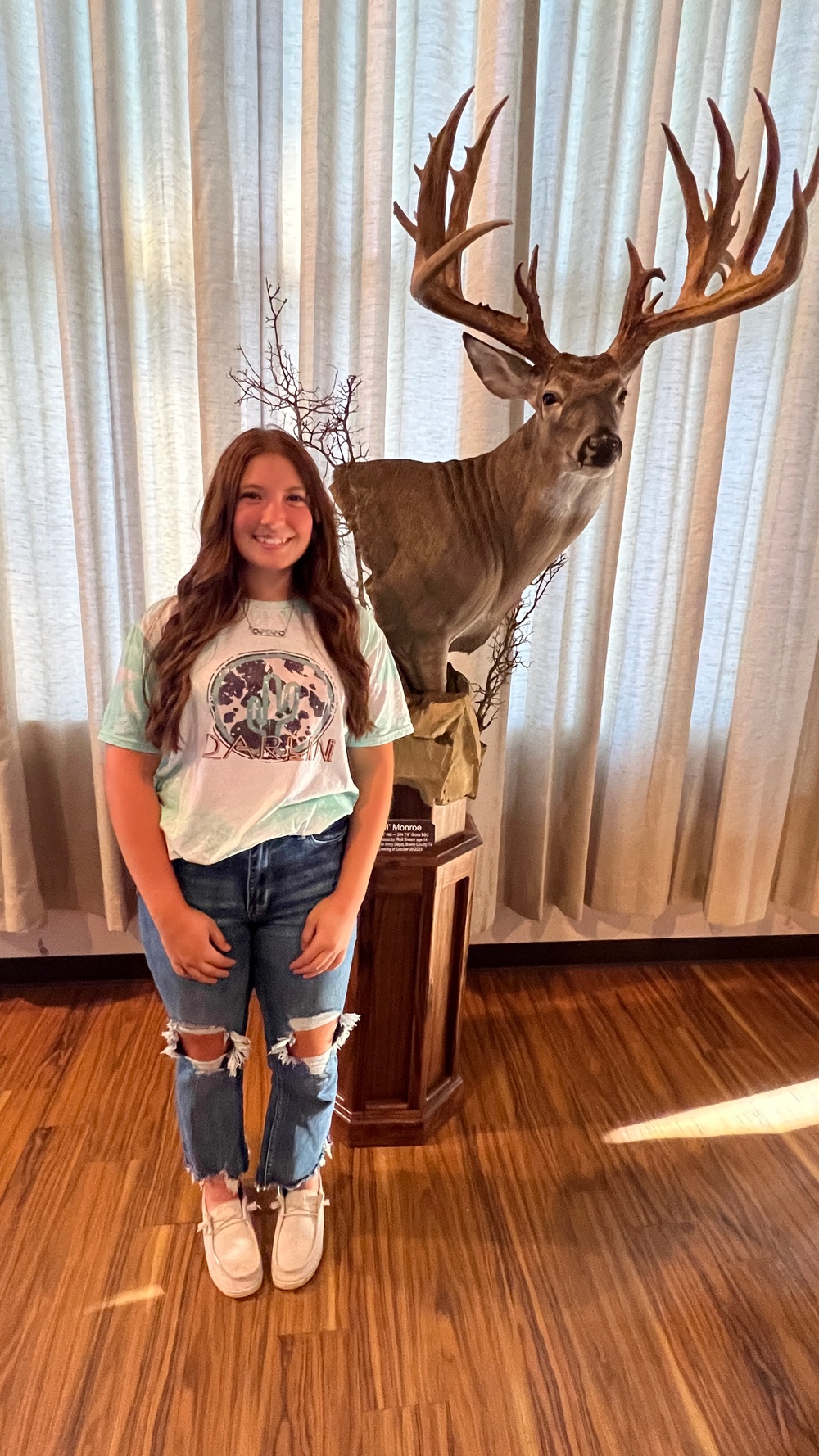 Local teen breaks white-tailed deer state record at Red River