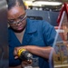 USS Ronald Reagan (CVN 76) Sailors fabricate machine parts