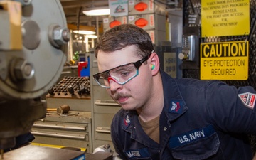 USS Ronald Reagan (CVN 76) Sailors fabricate machine parts