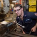 USS Ronald Reagan (CVN 76) Sailors fabricate machine parts