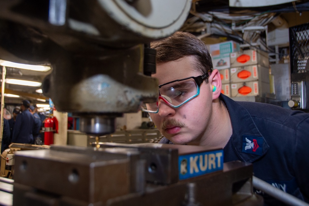 USS Ronald Reagan (CVN 76) Sailors fabricate machine parts