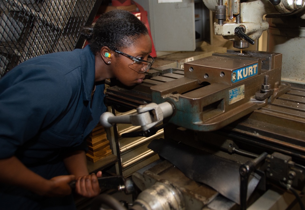 USS Ronald Reagan (CVN 76) Sailors fabricate machine parts