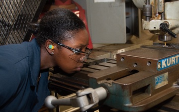 USS Ronald Reagan (CVN 76) Sailors fabricate machine parts