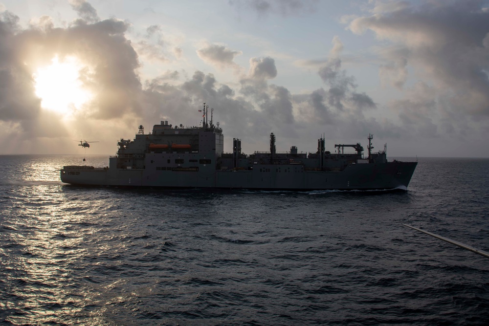 Abraham Lincoln conducts a replenishment-at-sea with Amelia Earhart