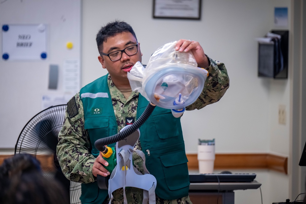 Navy Region Korea Practices Evacuating Families during Exercise