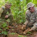 EOD team of joint service members conduct reconnaissance in Munda