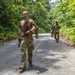 EOD team of joint service members conduct reconnaissance in Munda