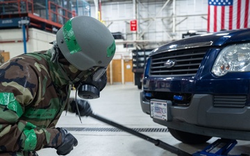 100th LRS repairs vehicle during base readiness exercise