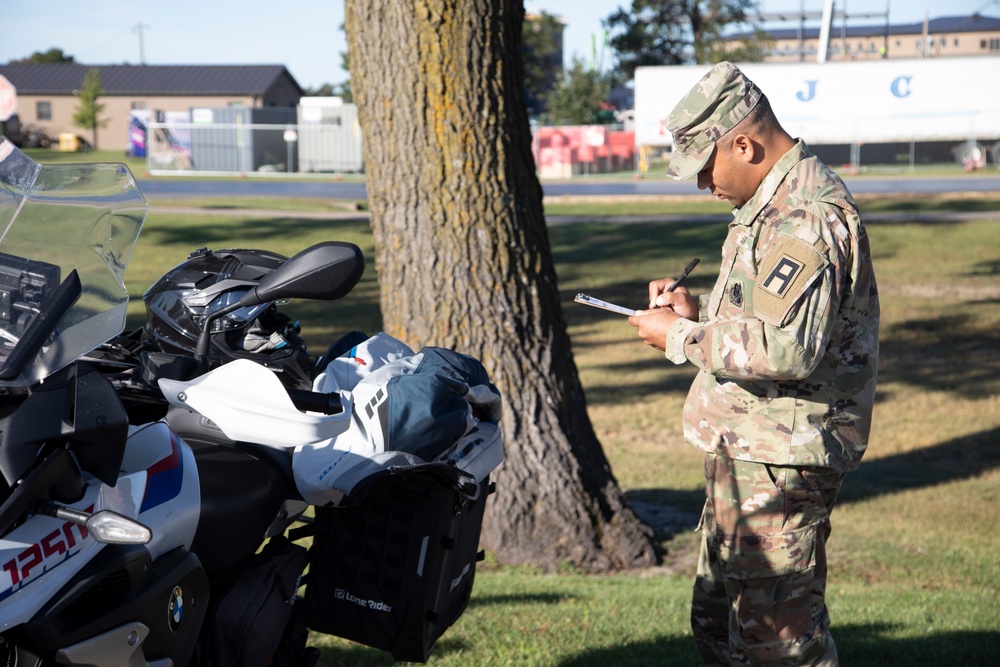 Motorcycle Mentor Inspects Motorcycle