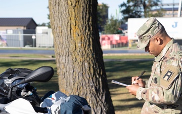 Motorcycle Mentor Inspects Motorcycle