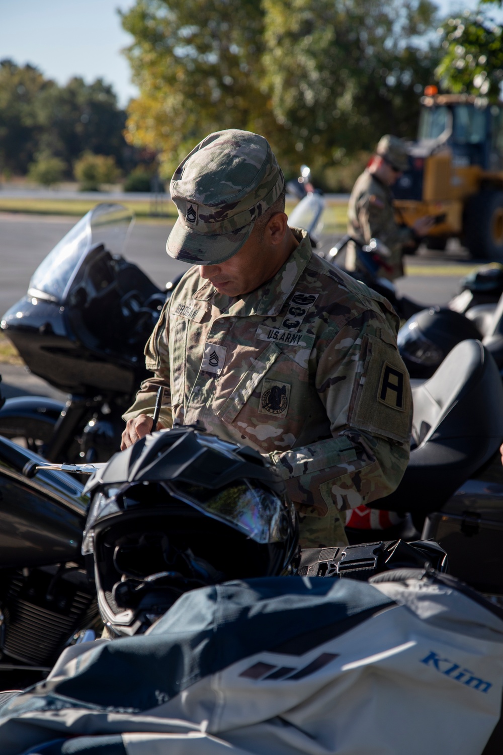 Motorcycle Mentor Inspects Motorcycle