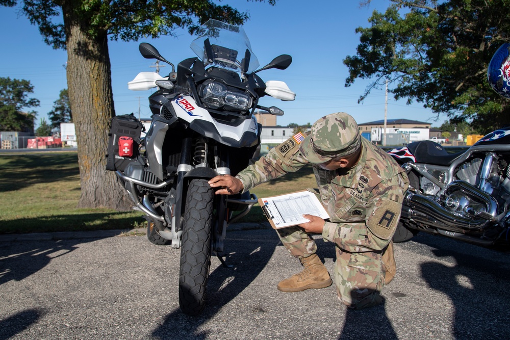 Motorcycle Mentor Inspects Motorcycle