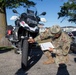 Motorcycle Mentor Inspects Motorcycle