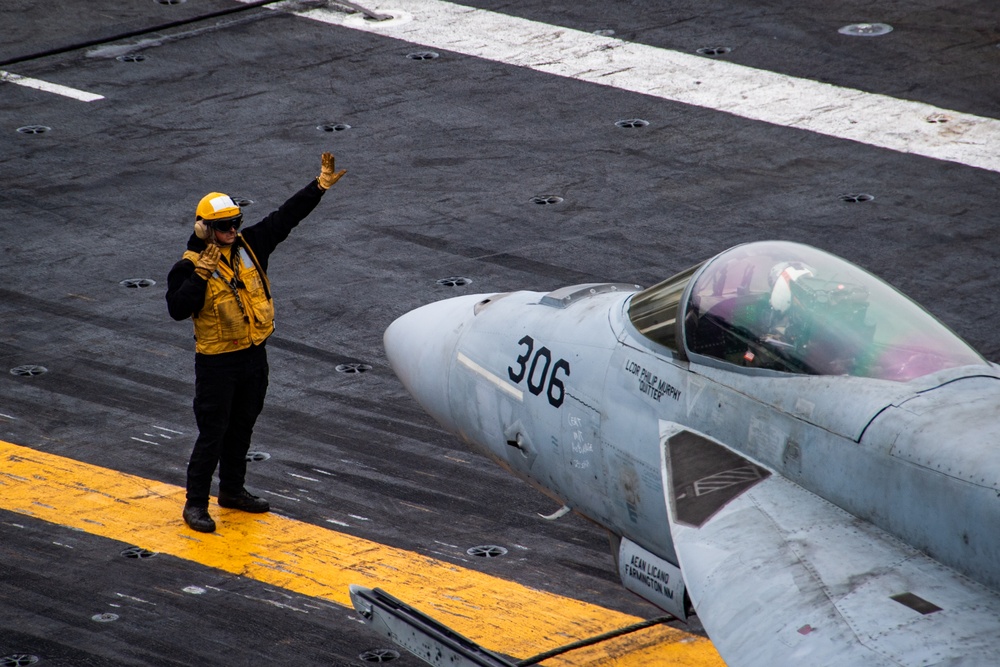 Nimitz Sailor Directs Aircraft