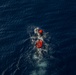 Sailors aboard the USS Howard conduct a small boat operation in the South China Sea