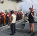 Sailors aboard the USS Howard conduct a small boat operation in the South China Sea