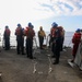 Sailors aboard the USS Howard conduct a small boat operation in the South China Sea