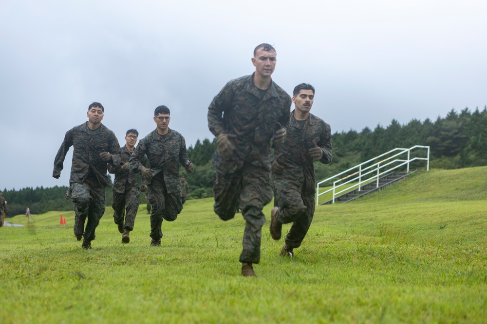 Marines participate in a Super Squad Competition at Camp Fuji in support of Exercise Outlaw Wrath 24