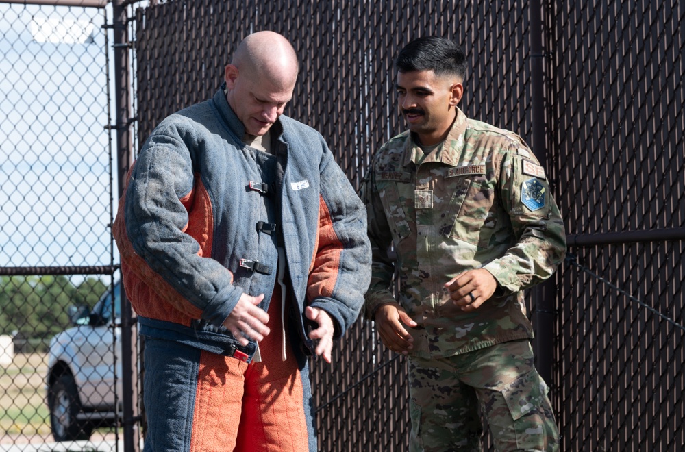 Space Base Delta 1 commander tours the kennels at Peterson Space Force Base