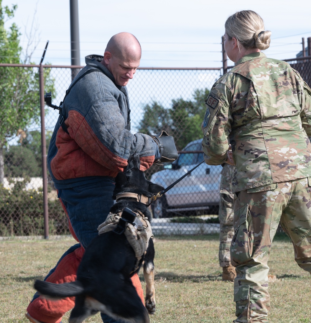 Space Base Delta 1 commander tours the kennels at Peterson Space Force Base