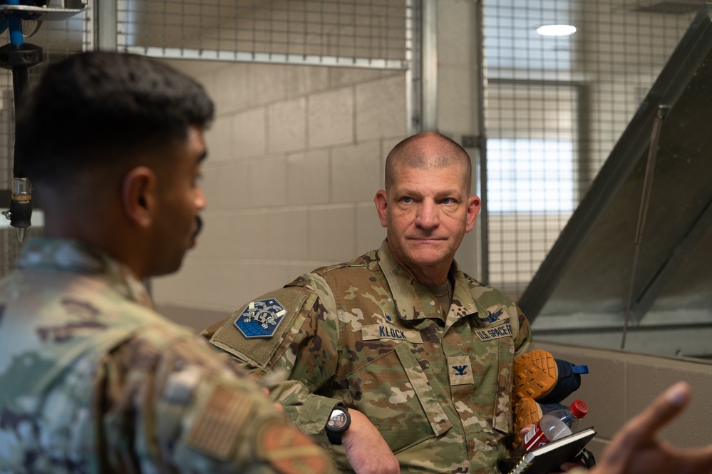 Space Base Delta 1 commander tours the kennels at Peterson Space Force Base