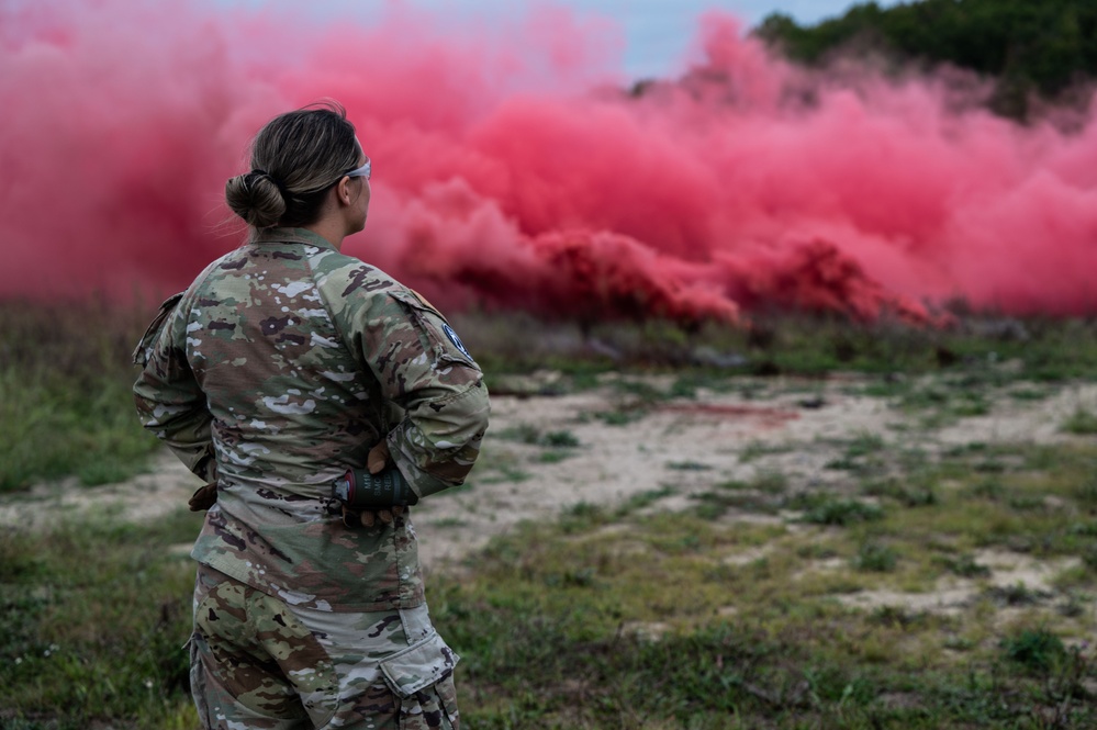 436th SFS executes smoke grenade training