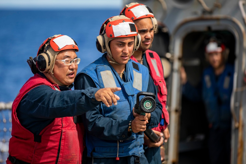 USS Ralph Johnson Conducts Crash and Salvage Drill