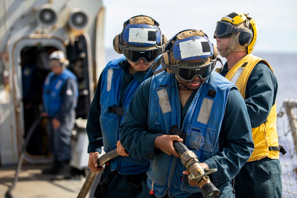USS Ralph Johnson Conducts Crash and Salvage Drill