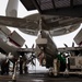 Nimitz Sailors Conduct Maintenance on a Hawkeye