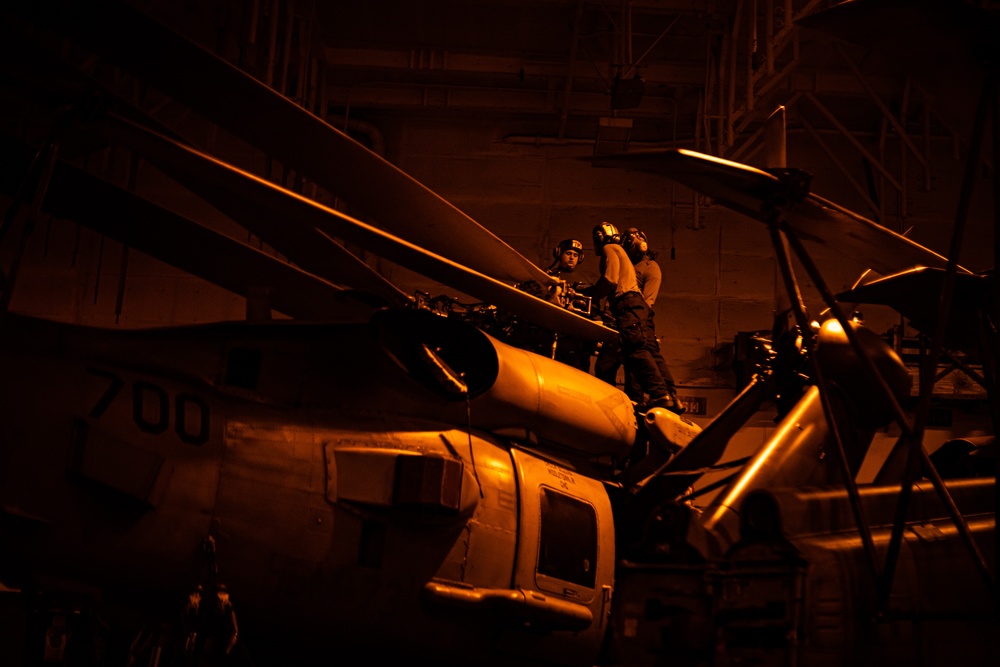 Nimitz Sailors Conduct Maintenance on Aircraft