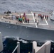 USS Curtis Wilbur Steams Alongside Nimitz