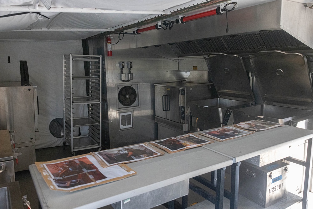 U.S. Marines with Food Service Company sets up an expeditionary field kitchen