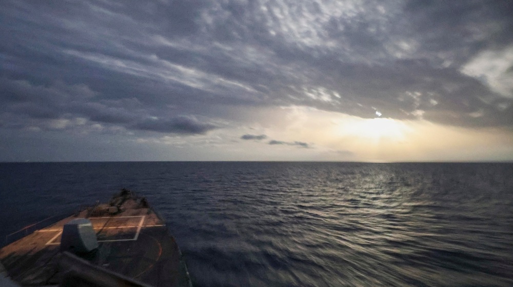 USS Arleigh Burke Sails in the Moonlight