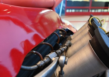 181st Intelligence Wing and IMS Museum Celebrate 70 Years with Iconic Race Car Display at Hulman Field