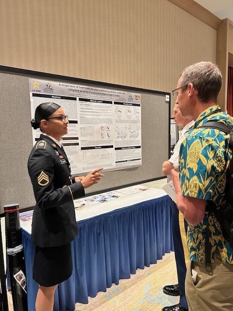 Staff Sgt. Irma I. Blanco presents poster at MHSRS 2024