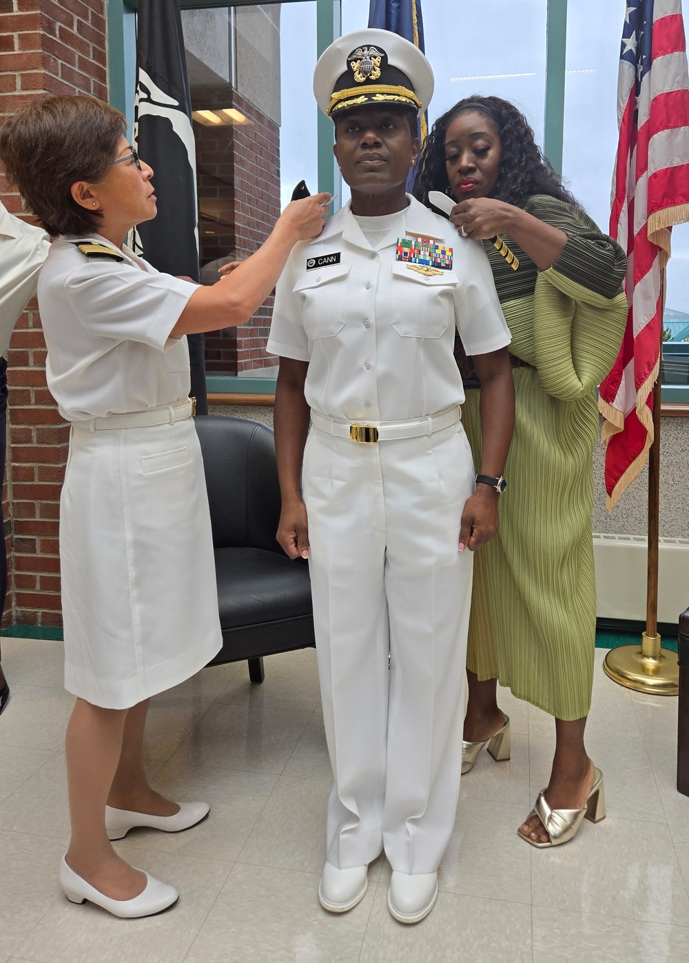 Captain Cann has shoulder boards attached