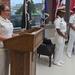 Chaplain Regina Johnson leads prayer