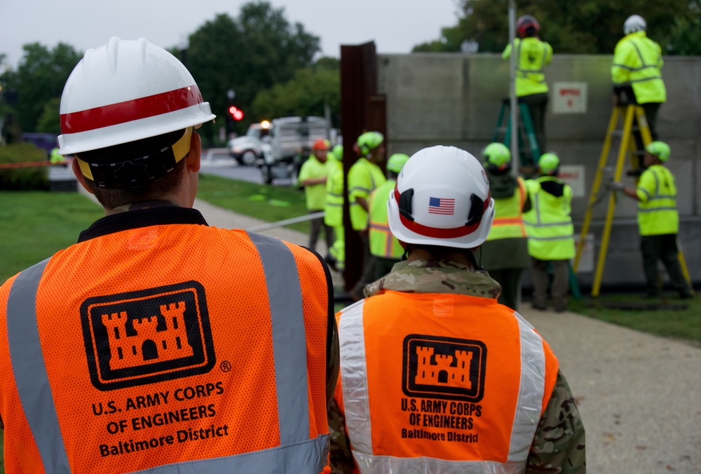 Leaders Watch as Workers Secure DC: Annual Levee Test Observed