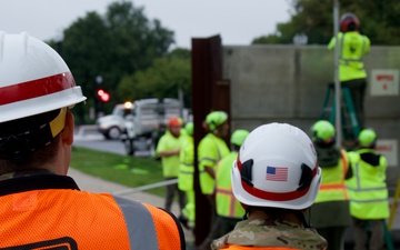 Leaders Watch as Workers Secure DC: Annual Levee Test Observed