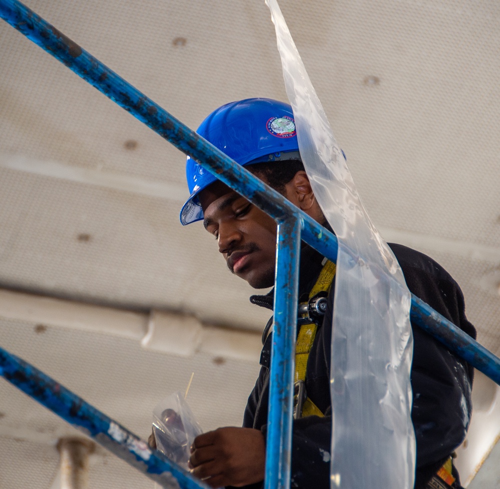 USS Ronald Reagan (CVN 76) Sailors prepare for a counter-measure washdown