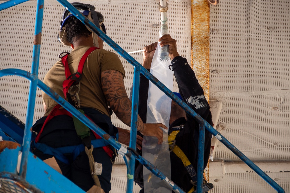 USS Ronald Reagan (CVN 76) Sailors prepare for a counter-measure washdown