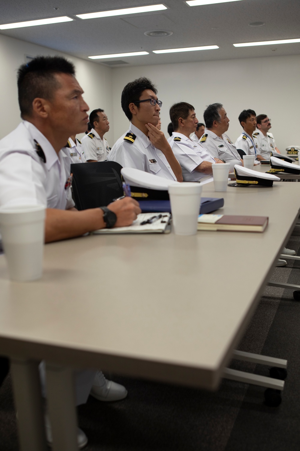 JMSDF Kure Hospital members tour the Naval Family Branch Clinic at MCAS Iwakuni