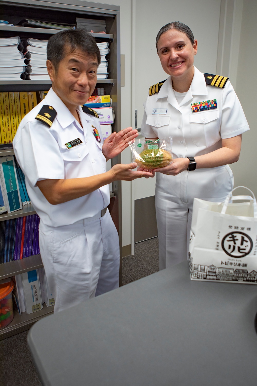 JMSDF Kure Hospital members tour the Naval Family Branch Clinic at MCAS Iwakuni