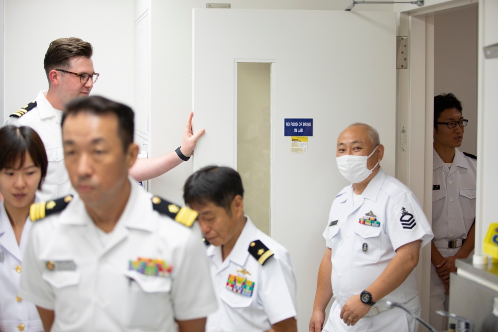 JMSDF Kure Hospital members tour the Naval Family Branch Clinic at MCAS Iwakuni