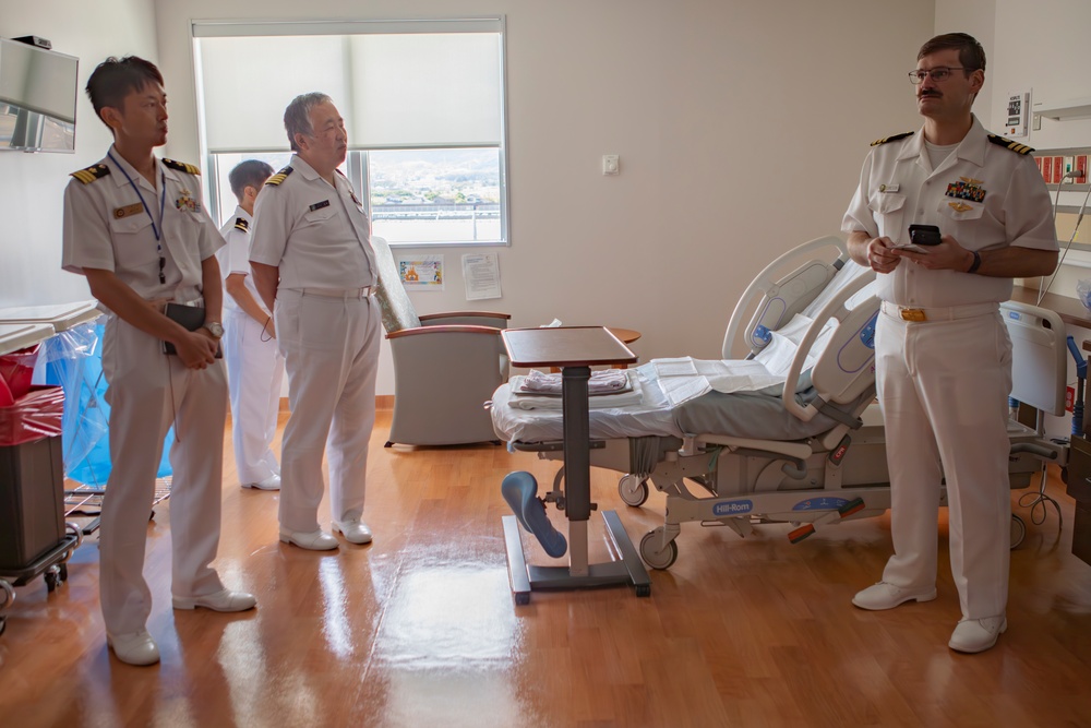 JMSDF Kure Hospital members tour the Naval Family Branch Clinic at MCAS Iwakuni