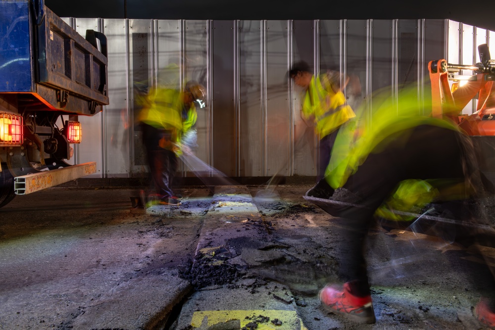 Paving the way: 374 CES makes nighttime road repairs