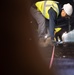 Paving the way: 374 CES makes nighttime road repairs