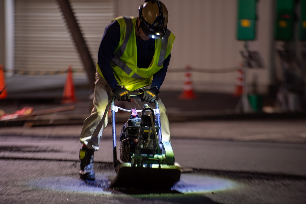 Paving the way: 374 CES makes nighttime road repairs