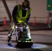 Paving the way: 374 CES makes nighttime road repairs